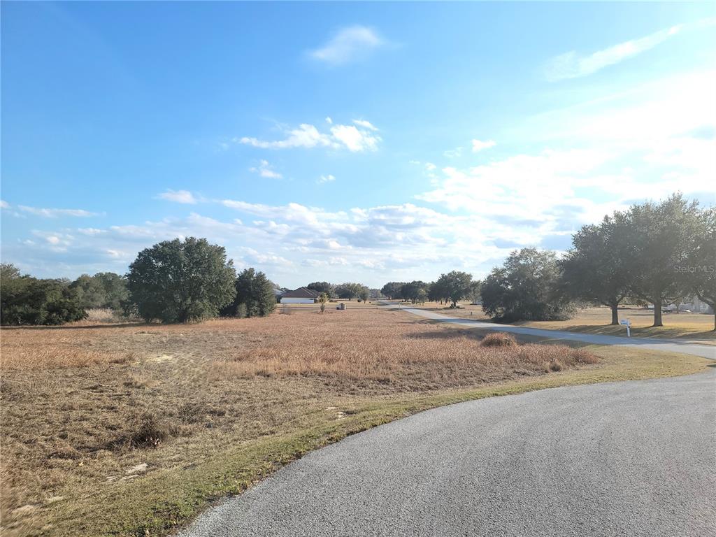 6 Eagle Run Groveland, FL 34736 - Photo 14 of 18 a view of an lake and a mountain