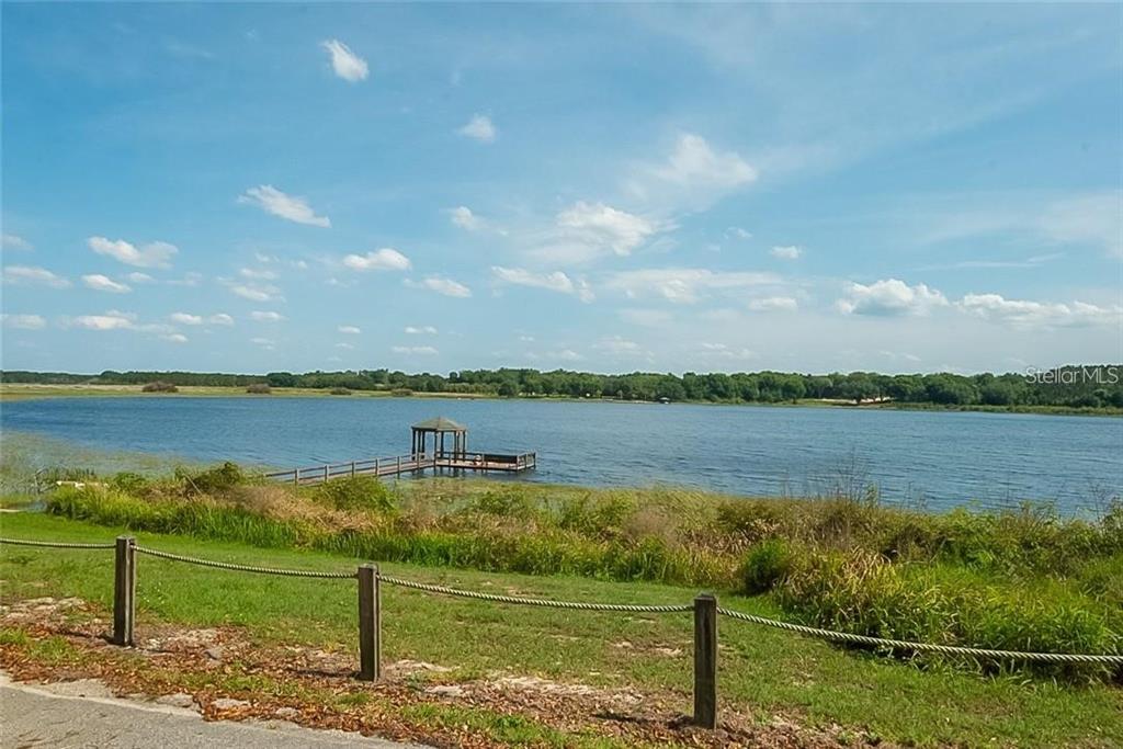 6 Eagle Run Groveland, FL 34736 - Photo 16 of 18 a view of a lake from a balcony