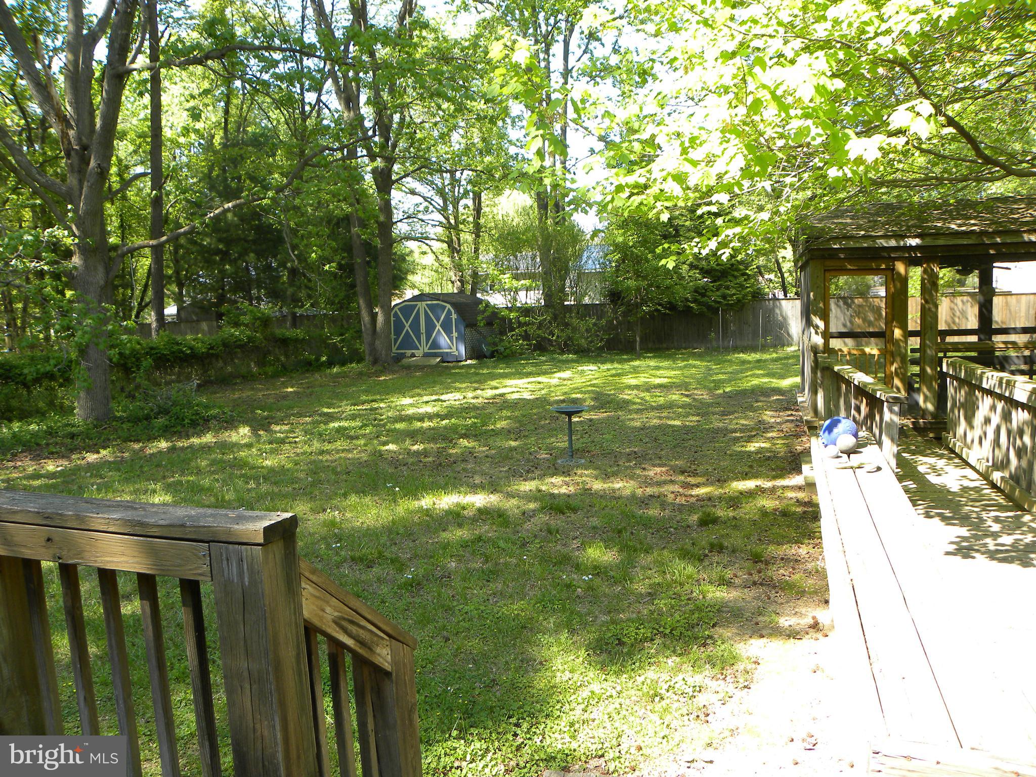 106 Utah Road Stevensville, MD 21666 - Photo 7 of 19 Fenced rear yard with shed