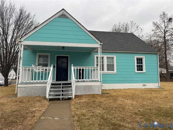 front view of a house with a small yard