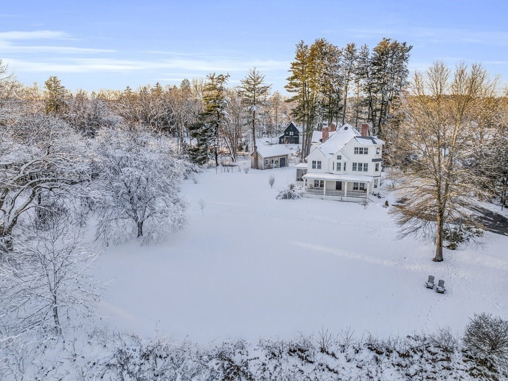 93 Coolidge Road Concord, MA 01742 - Photo 2 of 42 a view of beach and trees