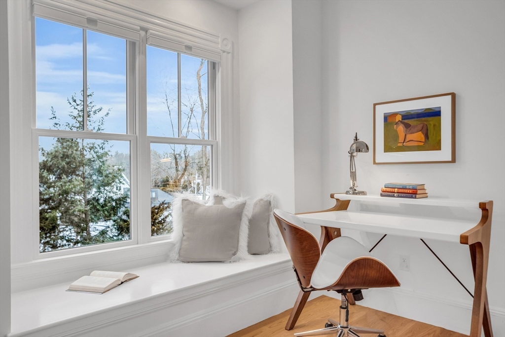 93 Coolidge Road Concord, MA 01742 - Photo 28 of 42 a living room with furniture and a window