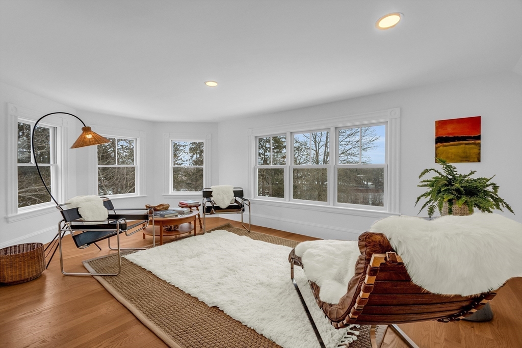 93 Coolidge Road Concord, MA 01742 - Photo 35 of 42 a living room with furniture and a window
