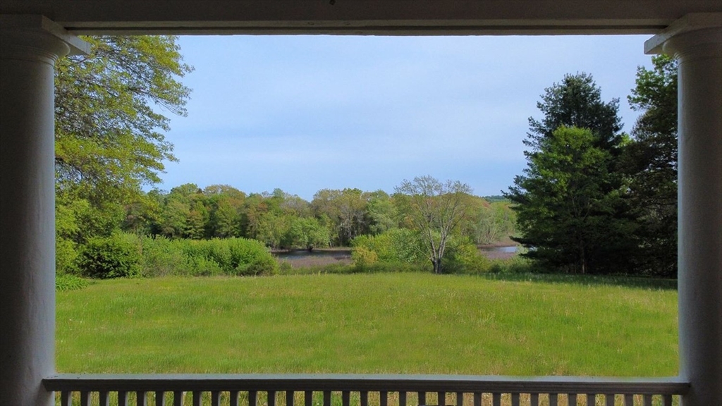 93 Coolidge Road Concord, MA 01742 - Photo 40 of 42 a view of an outdoor space with a lake view