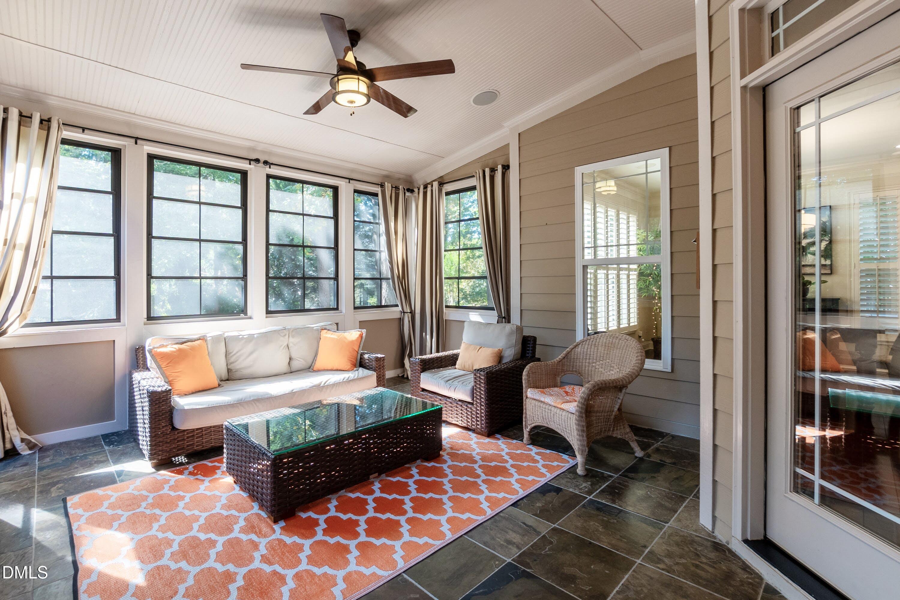 4213 Oakthorne Way Raleigh, NC 27613 - Photo 23 of 46 Comfortable 3 season room with EZ Breeze windows.