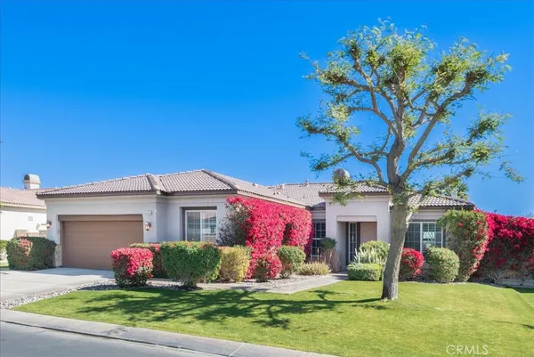 a front view of house with yard
