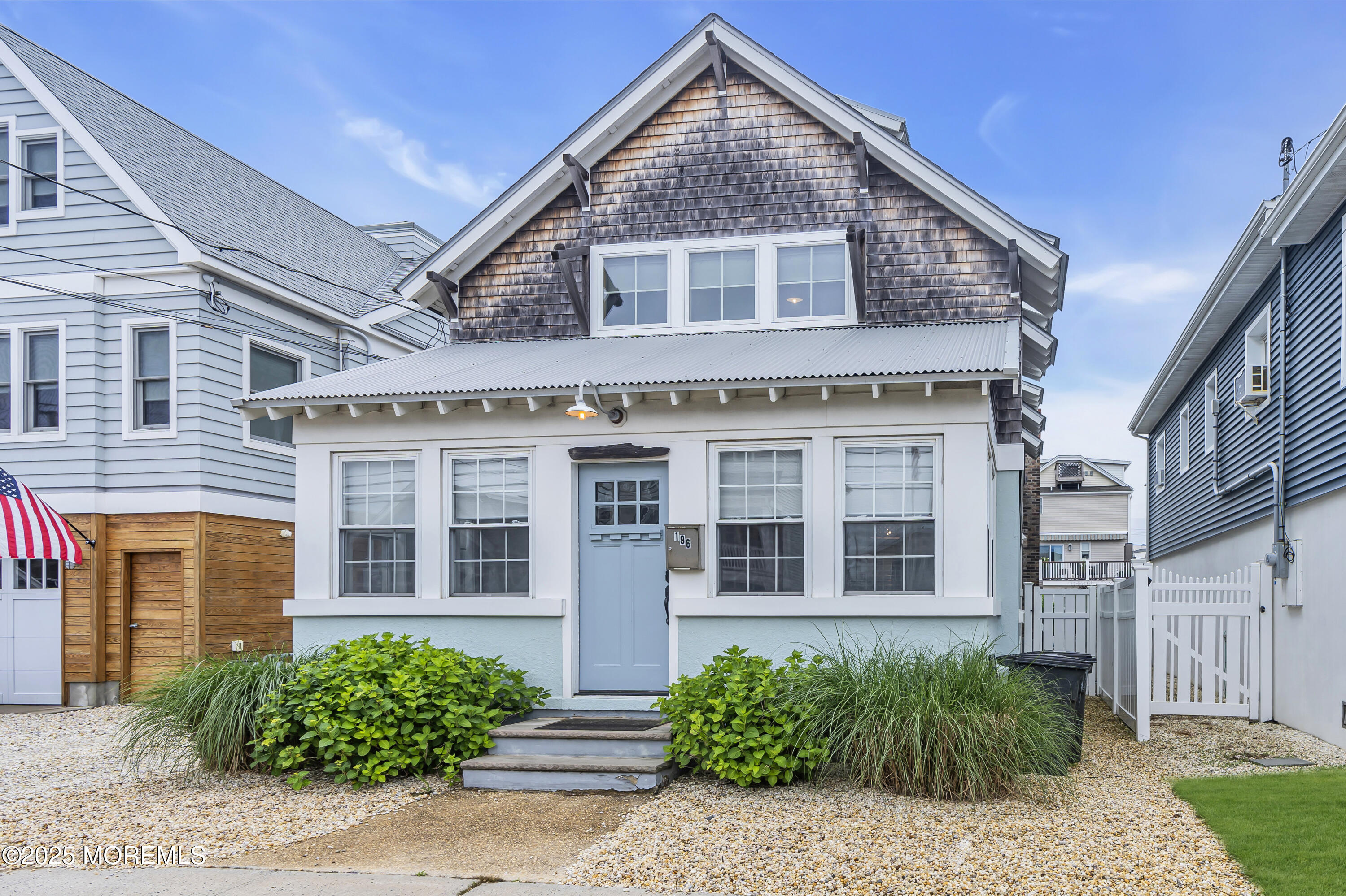 196 3rd Avenue Manasquan, NJ 08736 - Photo 1 of 36 a front view of a house with a yard