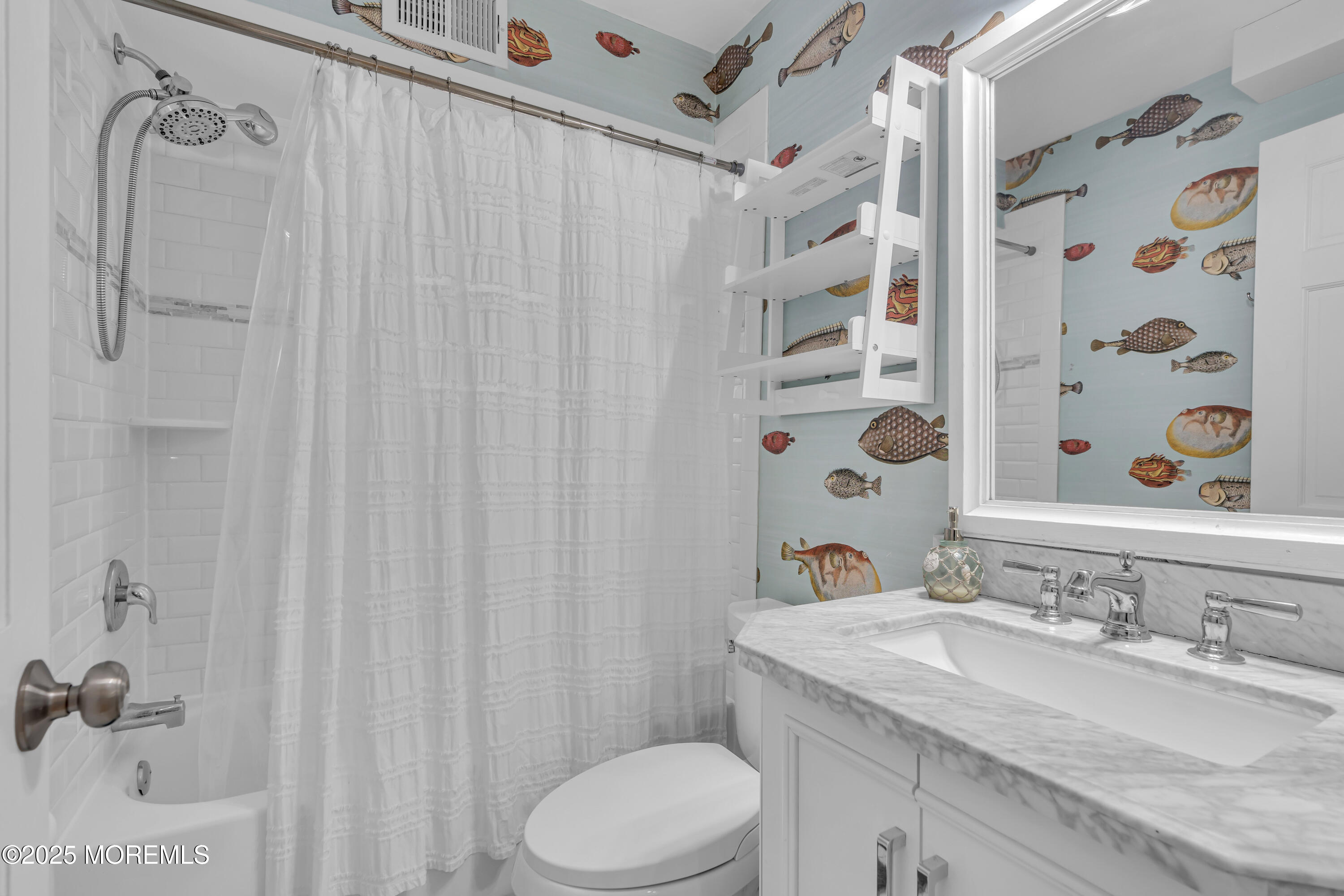 196 3rd Avenue Manasquan, NJ 08736 - Photo 14 of 36 a bathroom with a granite countertop sink and a mirror