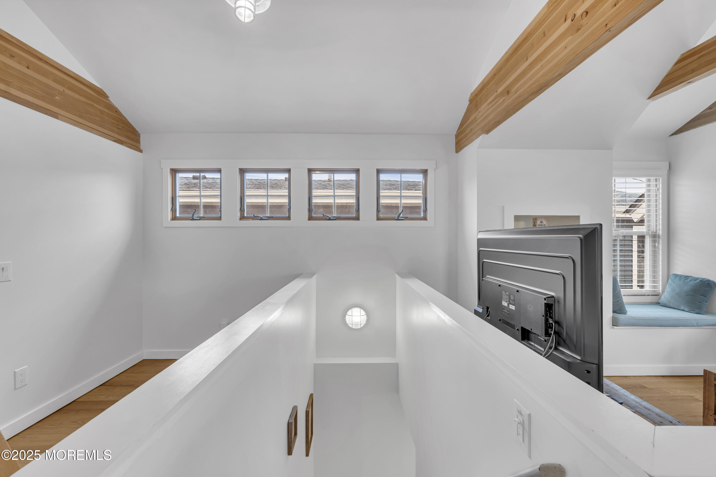 196 3rd Avenue Manasquan, NJ 08736 - Photo 18 of 36 a view of a livingroom with wooden floor