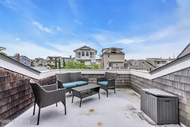 a view of a terrace with furniture