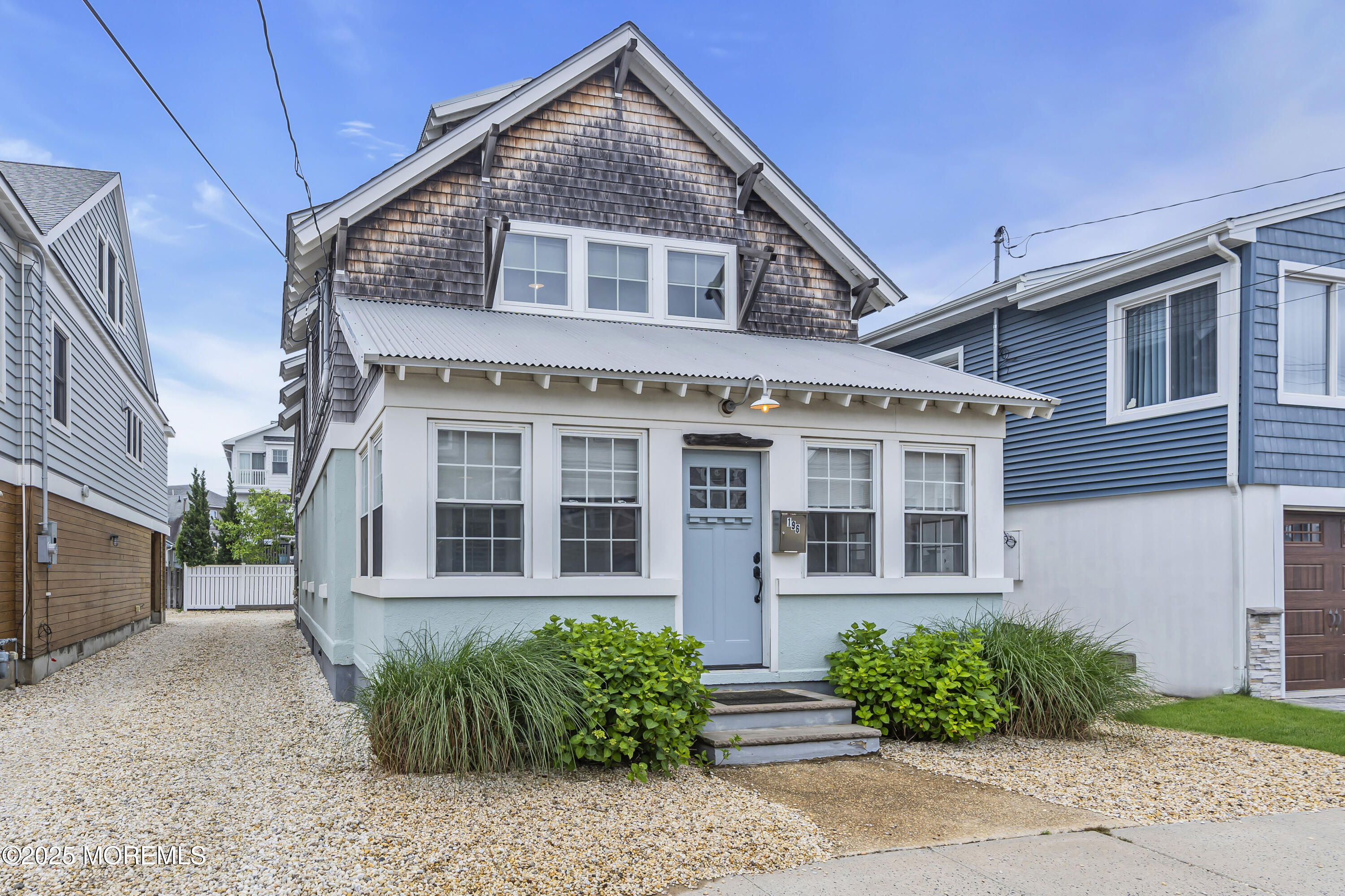 196 3rd Avenue Manasquan, NJ 08736 - Photo 28 of 36 a front view of a house with a garden