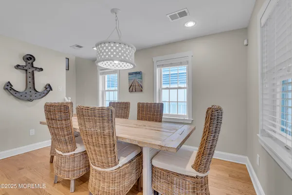 a kitchen with stainless steel appliances a refrigerator and a stove top oven