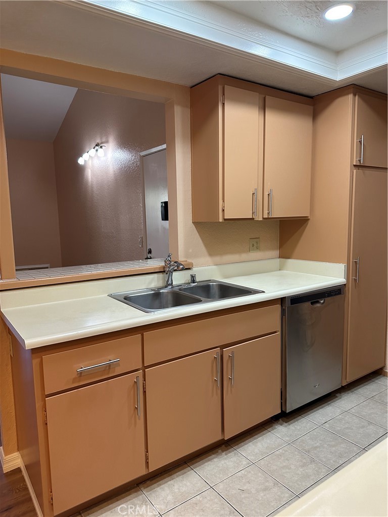 20702 El Toro Road, Unit 240 Lake Forest, CA 92630 - Photo 10 of 30 a bathroom with a sink and a mirror