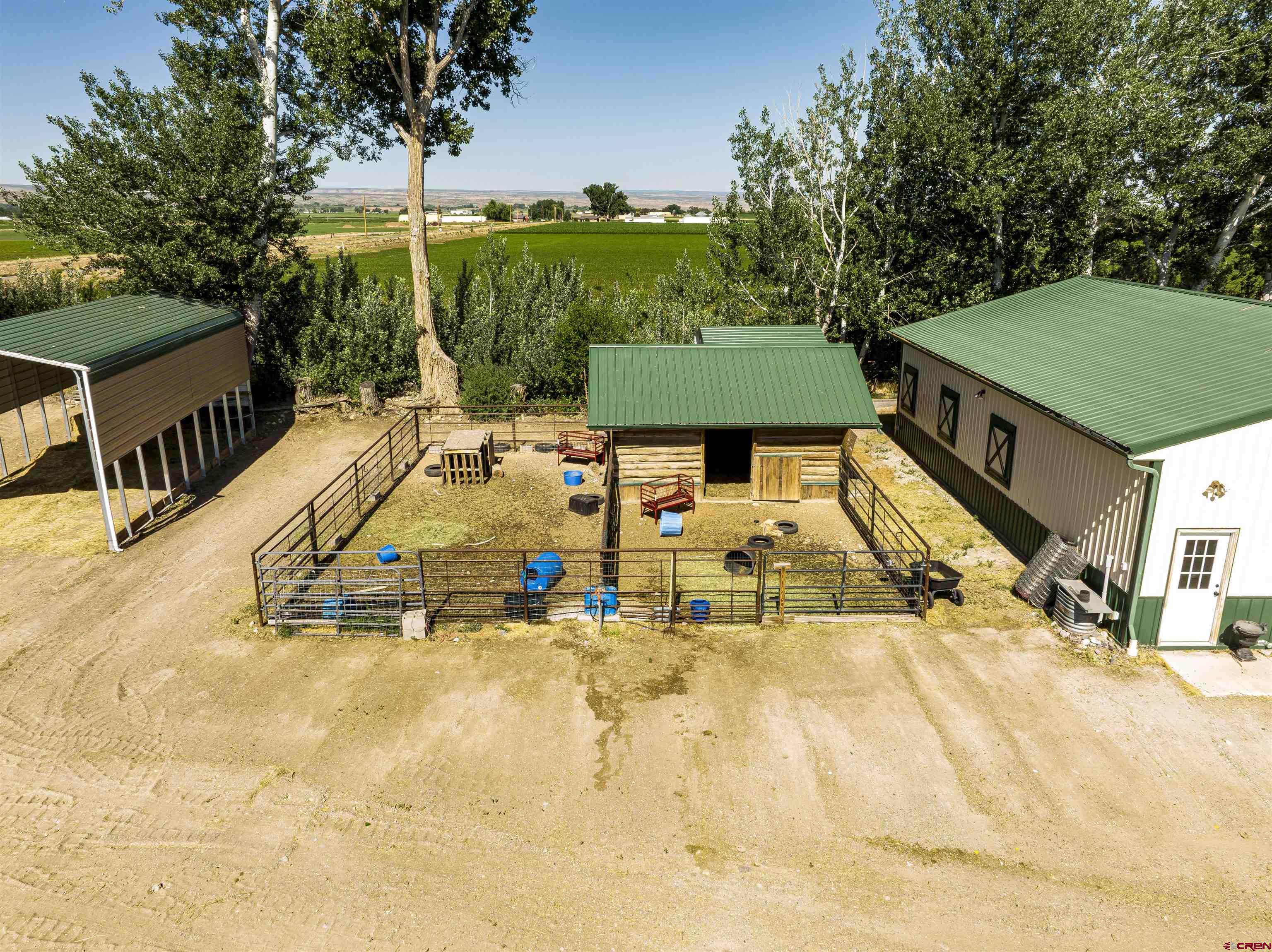54867 Banner Road Delta, CO 81416 - Photo 9 of 33 a view of a swimming pool with a patio