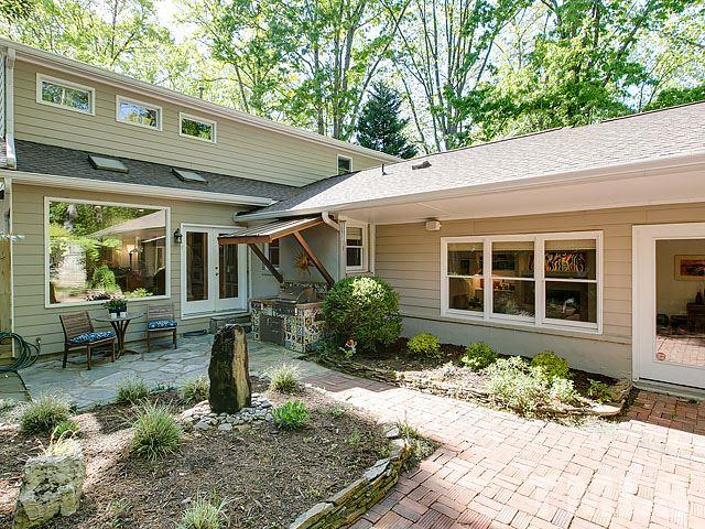 2004 Buckingham Road Raleigh, NC 27607 - Photo 2 of 25 a front view of a house with garden