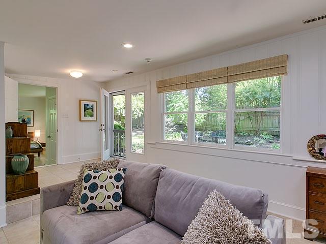 2004 Buckingham Road Raleigh, NC 27607 - Photo 16 of 25 a living room with furniture and a large window