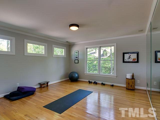 2004 Buckingham Road Raleigh, NC 27607 - Photo 21 of 25 a bedroom with furniture and a window