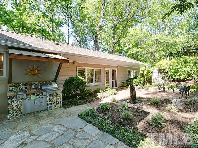 2004 Buckingham Road Raleigh, NC 27607 - Photo 24 of 25 a front view of a house with a porch