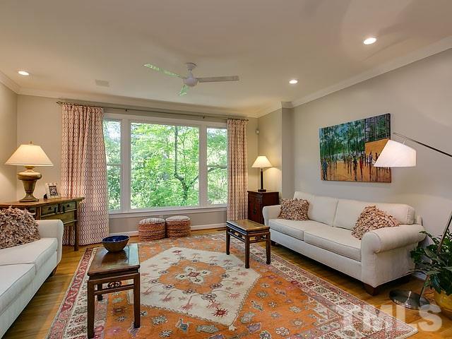 2004 Buckingham Road Raleigh, NC 27607 - Photo 4 of 25 a living room with furniture and a large window