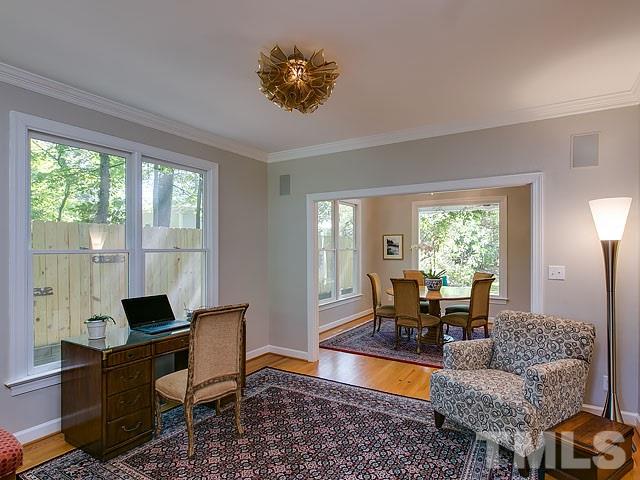 2004 Buckingham Road Raleigh, NC 27607 - Photo 10 of 25 a living room with furniture and a large window