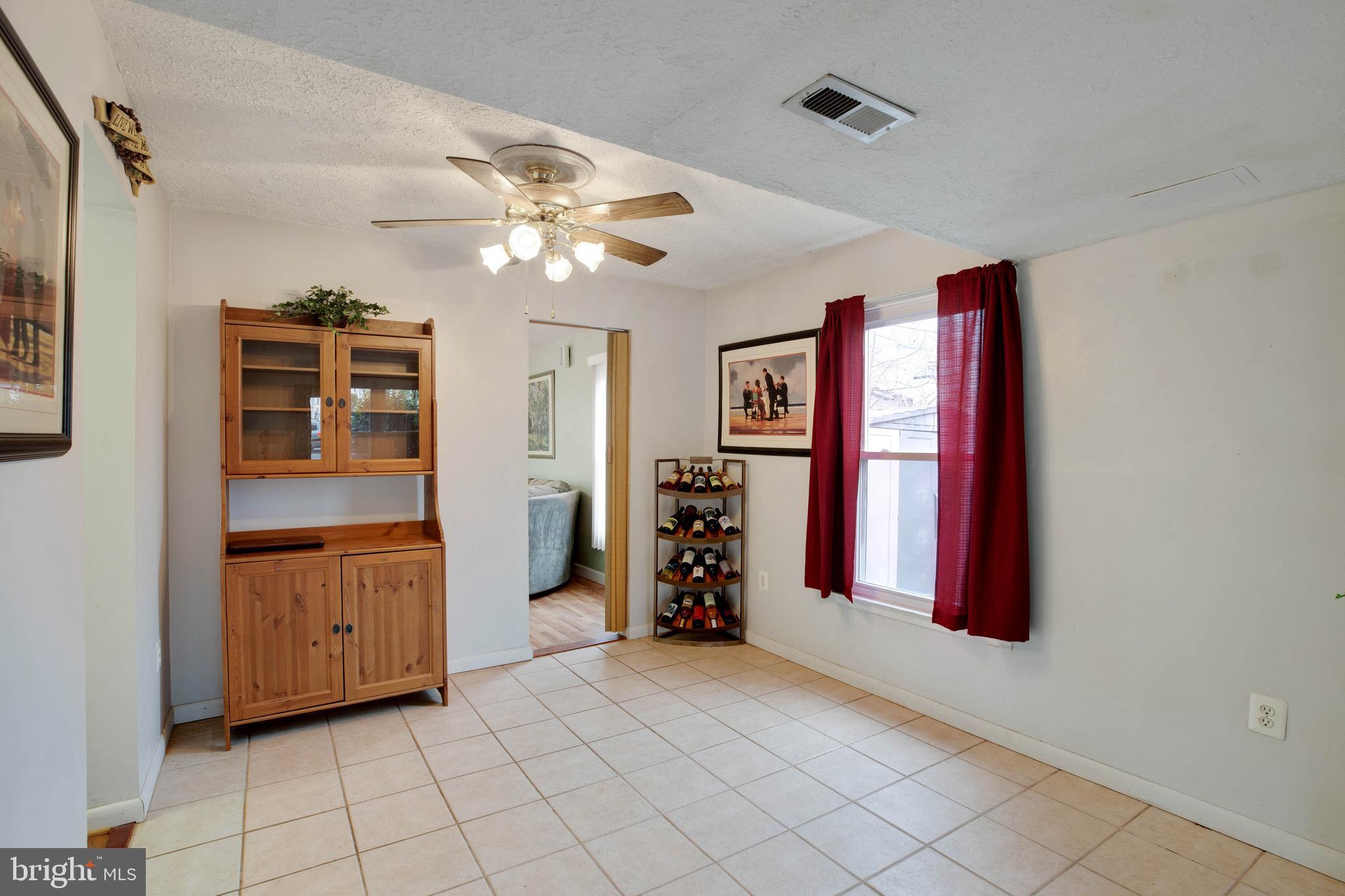 3806 Port Hope Point Triangle, VA 22172 - Photo 7 of 29 Separate dining room with tile flooring
