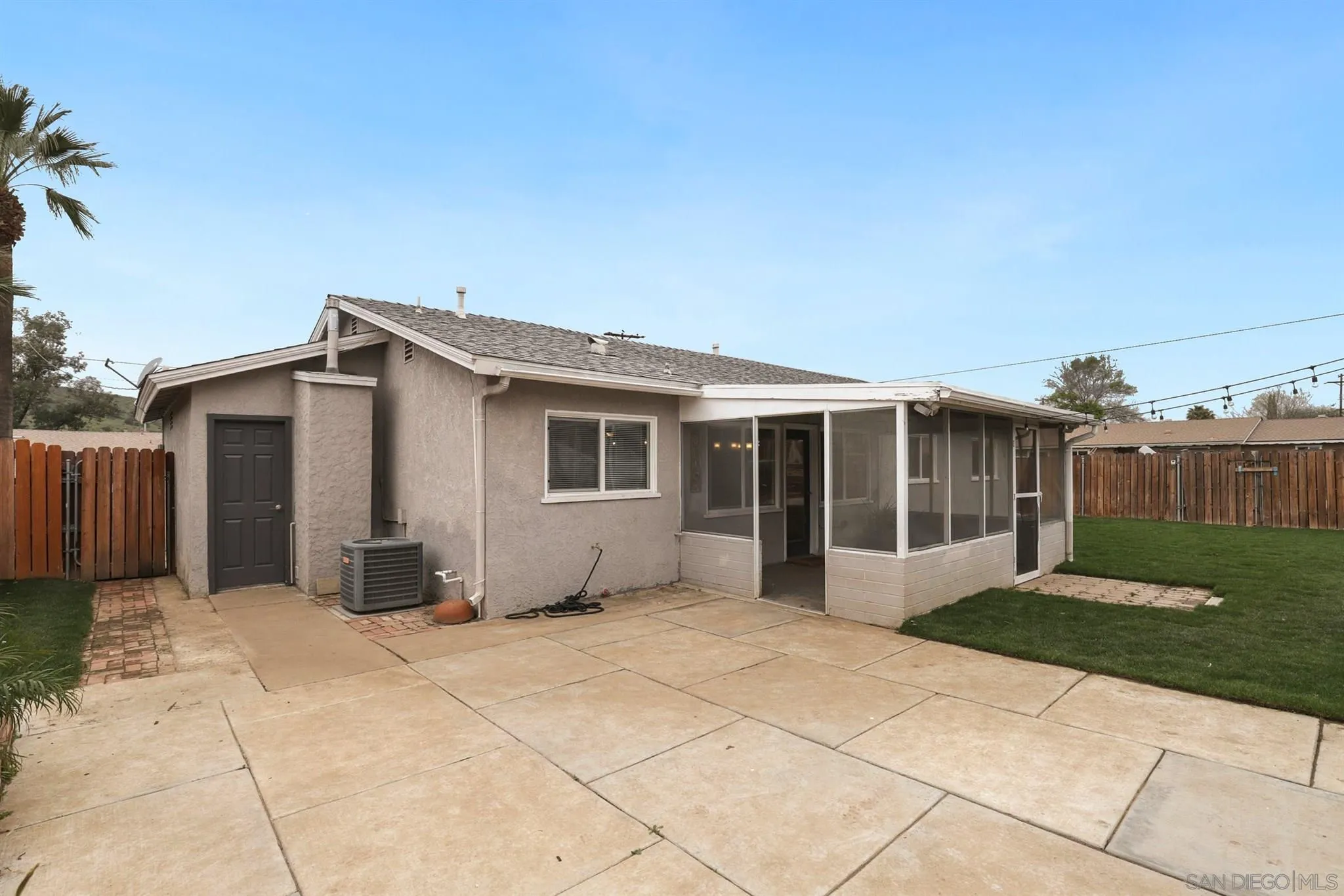 9753 Settle Road Santee, CA 92071 - Photo 20 of 31 a view of a house with a garden