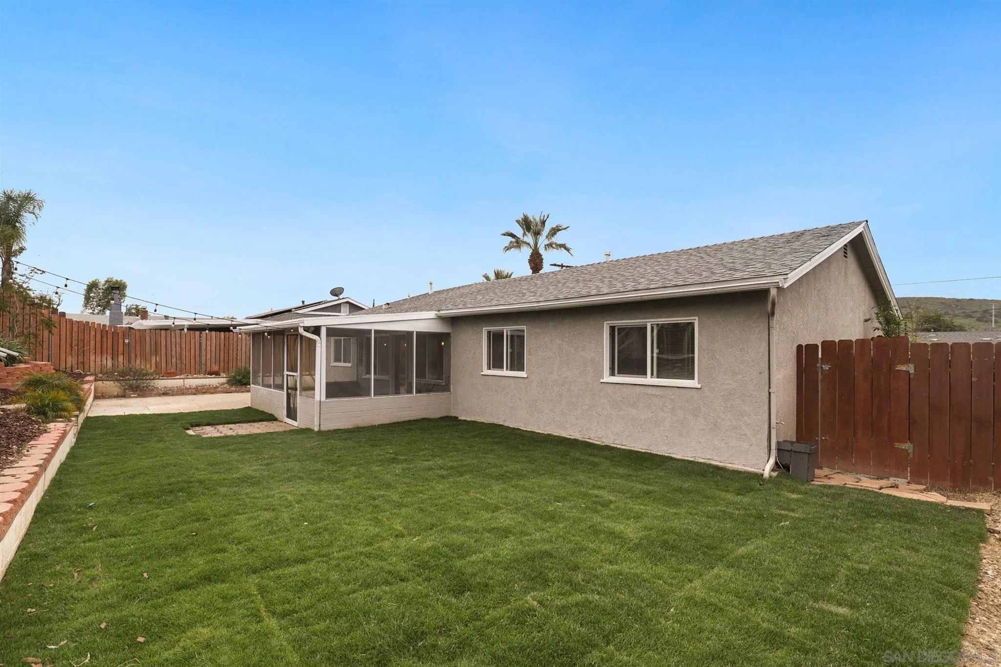 9753 Settle Road Santee, CA 92071 - Photo 21 of 31 a view of a house with a yard
