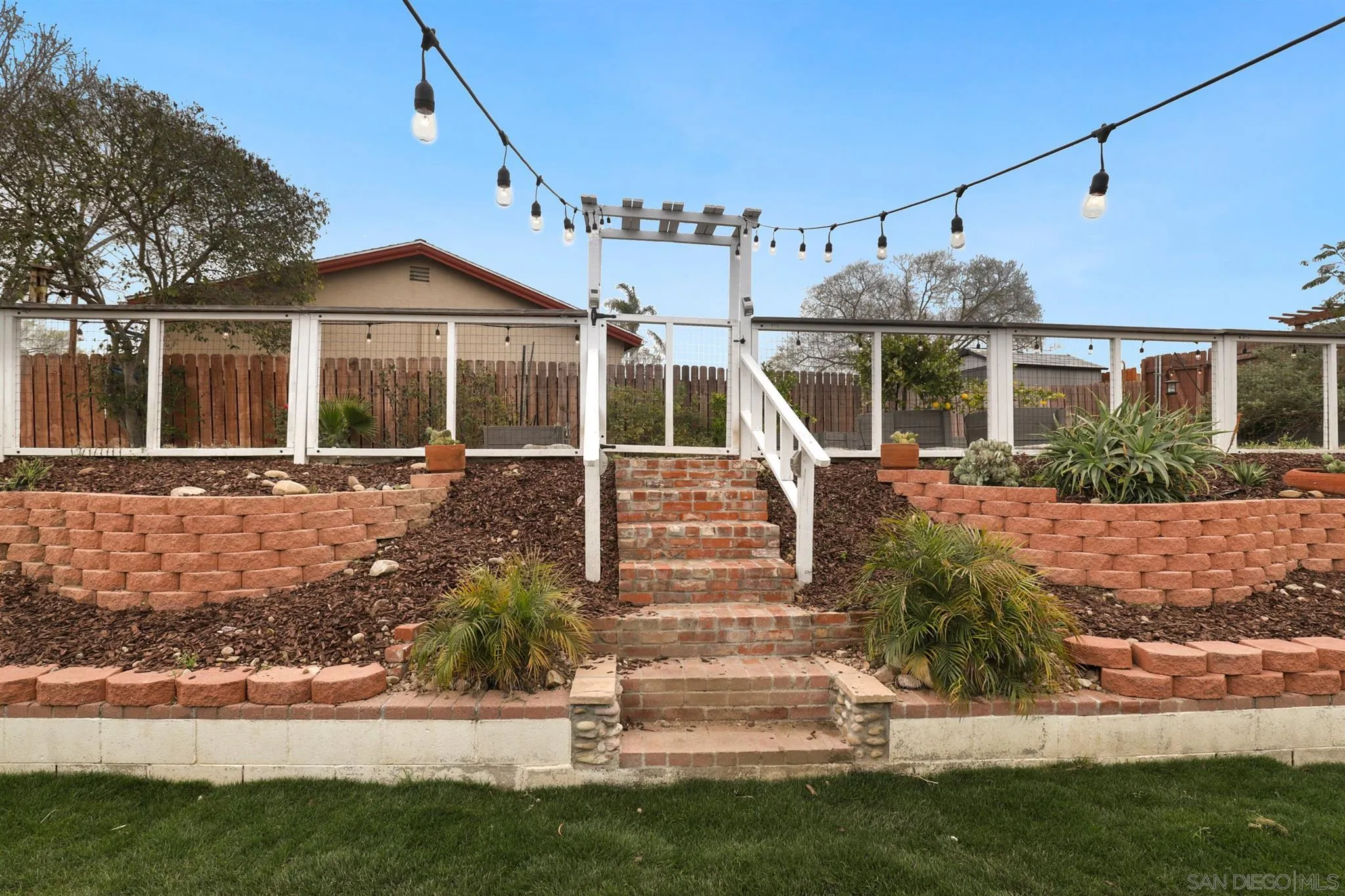 9753 Settle Road Santee, CA 92071 - Photo 25 of 31 front view of house with a yard