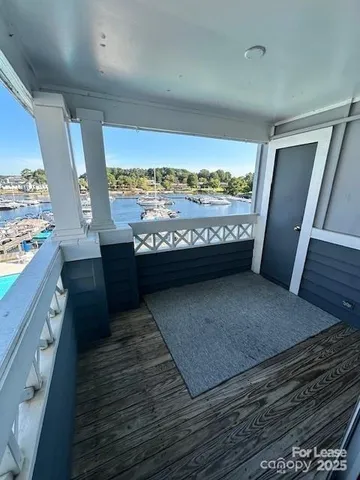 a view of washer and dryer with wooden floor