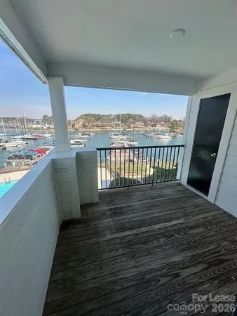 a view of balcony with furniture