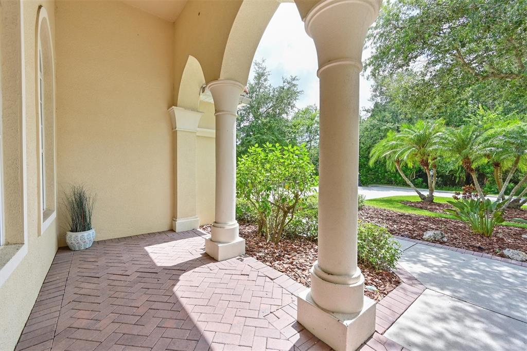 10622 Conch Shell Terrace Bradenton, FL 34212 - Photo 46 of 69 a front view of a house with garden