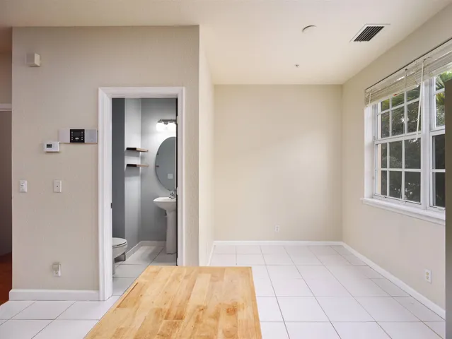 a bathroom with a tub and shower