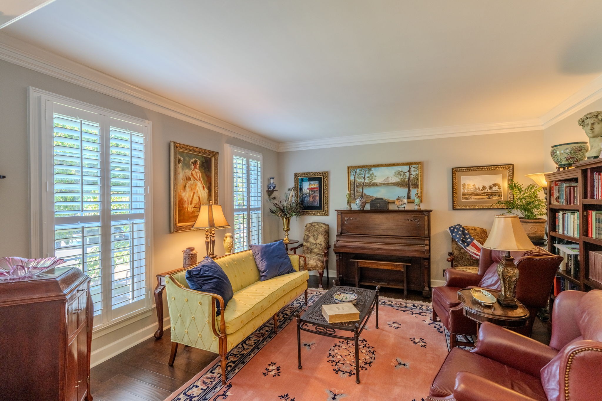 404 Chesterfield Place Franklin, TN 37064 - Photo 7 of 38 a living room with furniture a flat screen tv and a window