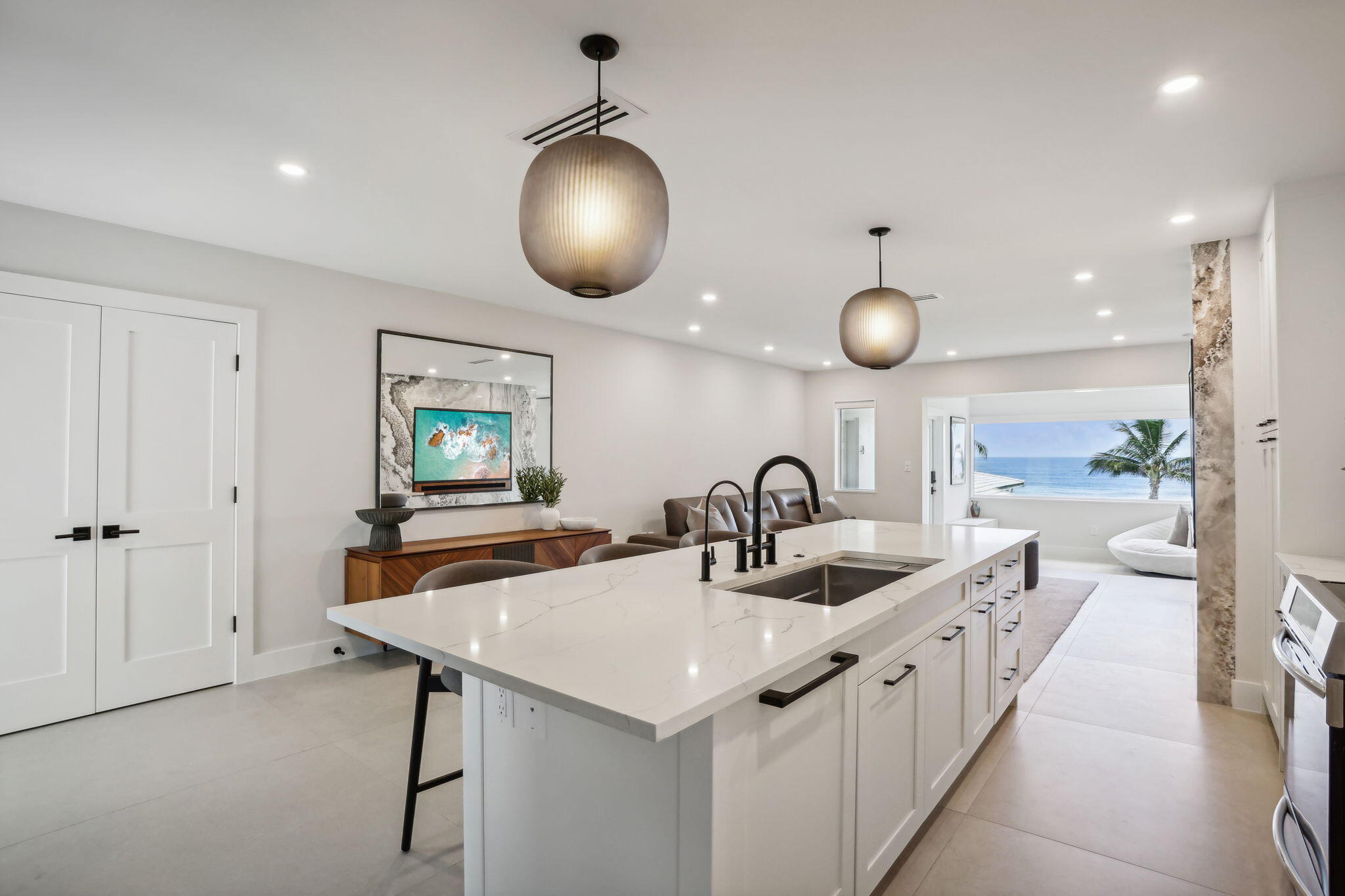 3401 South Ocean Boulevard, Unit 6 Highland Beach, FL 33487 - Photo 11 of 33 a kitchen with counter space and a sink
