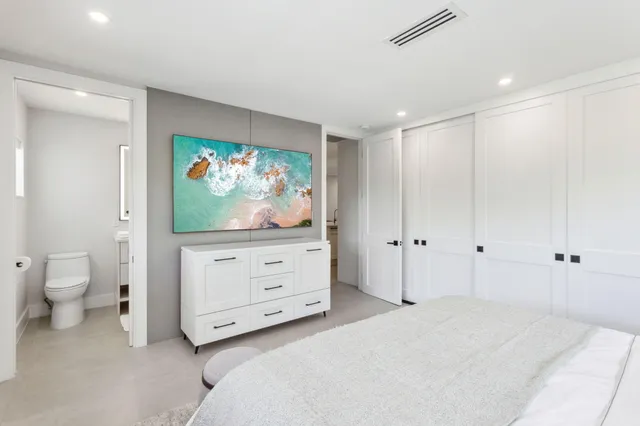 a kitchen with stainless steel appliances granite countertop a sink and a stove