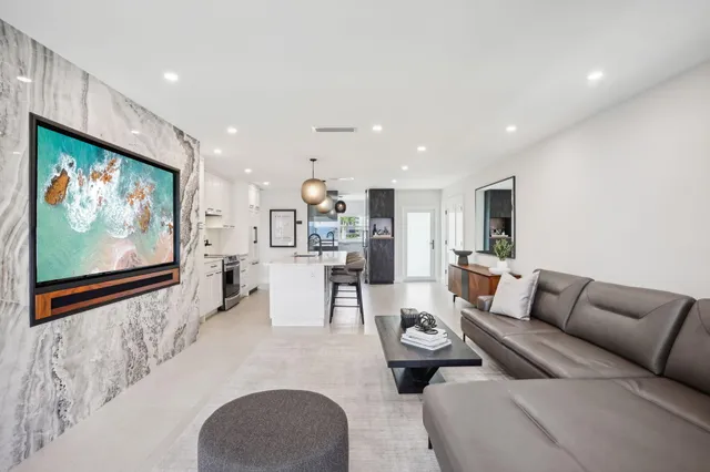 a view of a swimming pool with a table and chairs
