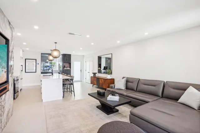 a view of a chairs and table in the patio