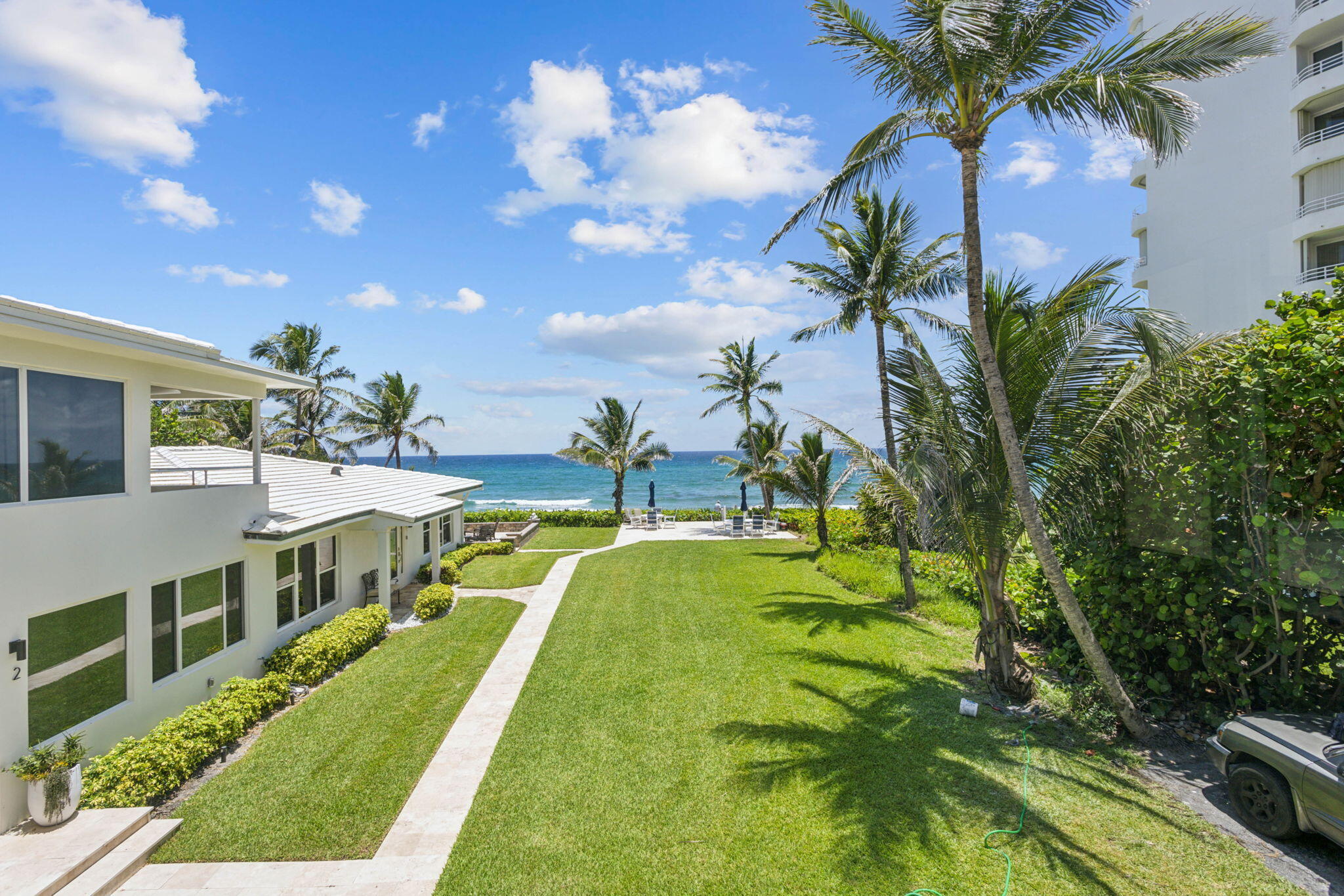 3401 South Ocean Boulevard, Unit 6 Highland Beach, FL 33487 - Photo 2 of 33 a view of an house with swimming pool