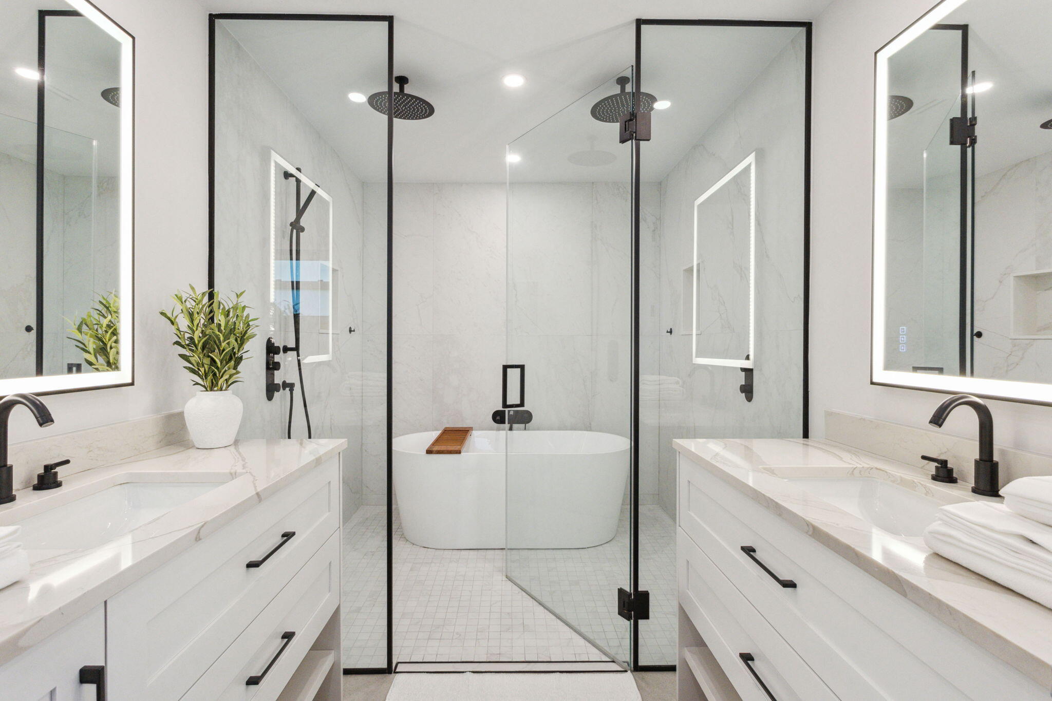 3401 South Ocean Boulevard, Unit 6 Highland Beach, FL 33487 - Photo 6 of 33 a bathroom with a double vanity sink mirror and shower