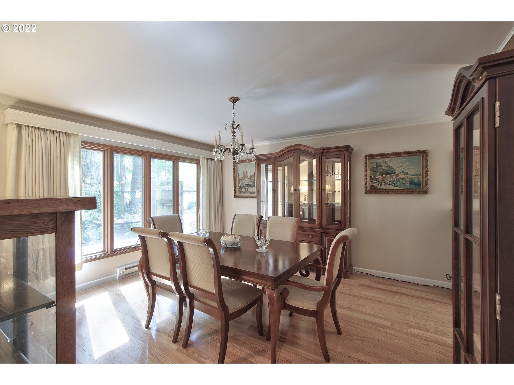 23590 South Beatie Road Oregon City, OR 97045 - Photo 8 of 32 a view of a dining room with furniture window and wooden floor