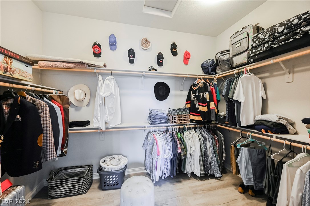 79 Hawking Ridge Way Las Vegas, NV 89183 - Photo 50 of 77 **His** 2nd Walk-in Closet** Master Bedroom