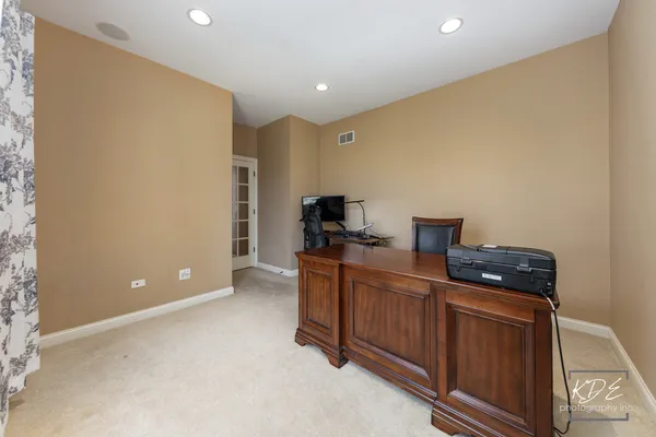 a kitchen with stainless steel appliances a stove and a refrigerator
