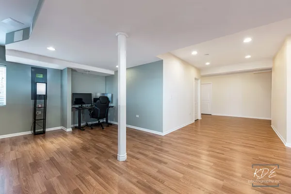 a view of livingroom with furniture and wooden floor