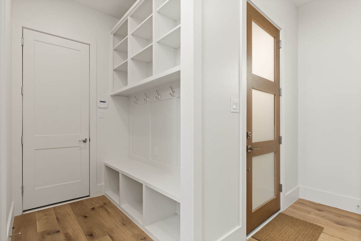 710 Waverly Street, Unit E Houston, TX 77007 - Photo 7 of 19 a view of walk in closet with empty racks