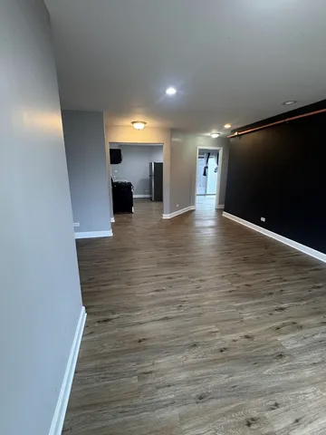 a view of a living room with a flat screen tv