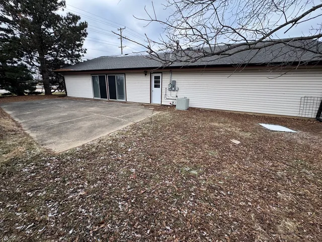 a view of a house with a snow