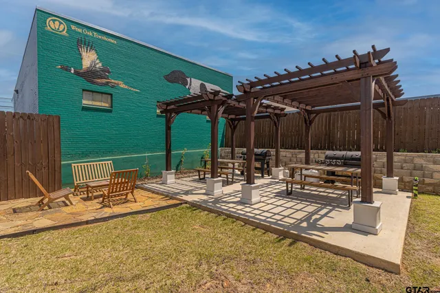 a view of a tables and chairs in patio