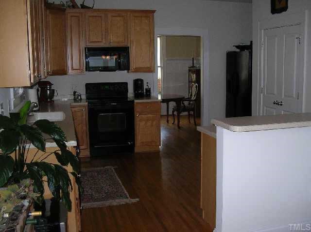 3412 Falls River Raleigh, NC 27614 - Photo 4 of 10 Large Open Kitchen at center of Home