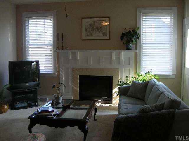 3412 Falls River Raleigh, NC 27614 - Photo 6 of 10 Den W/ Fireplace open to Breakfast area & eat at Kitchen Bar