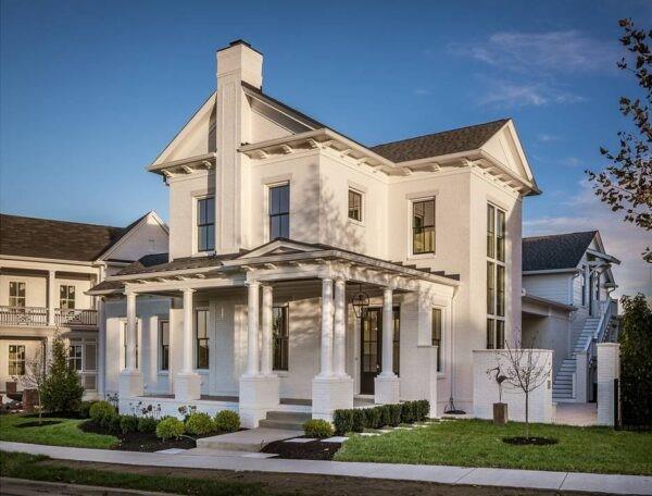 20 Ritchie Road Woodway, TX 76712 - Photo 2 of 2 a front view of a white building with a small yard and plants